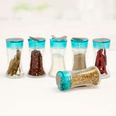 small glass spice bottle jar with plastic lid